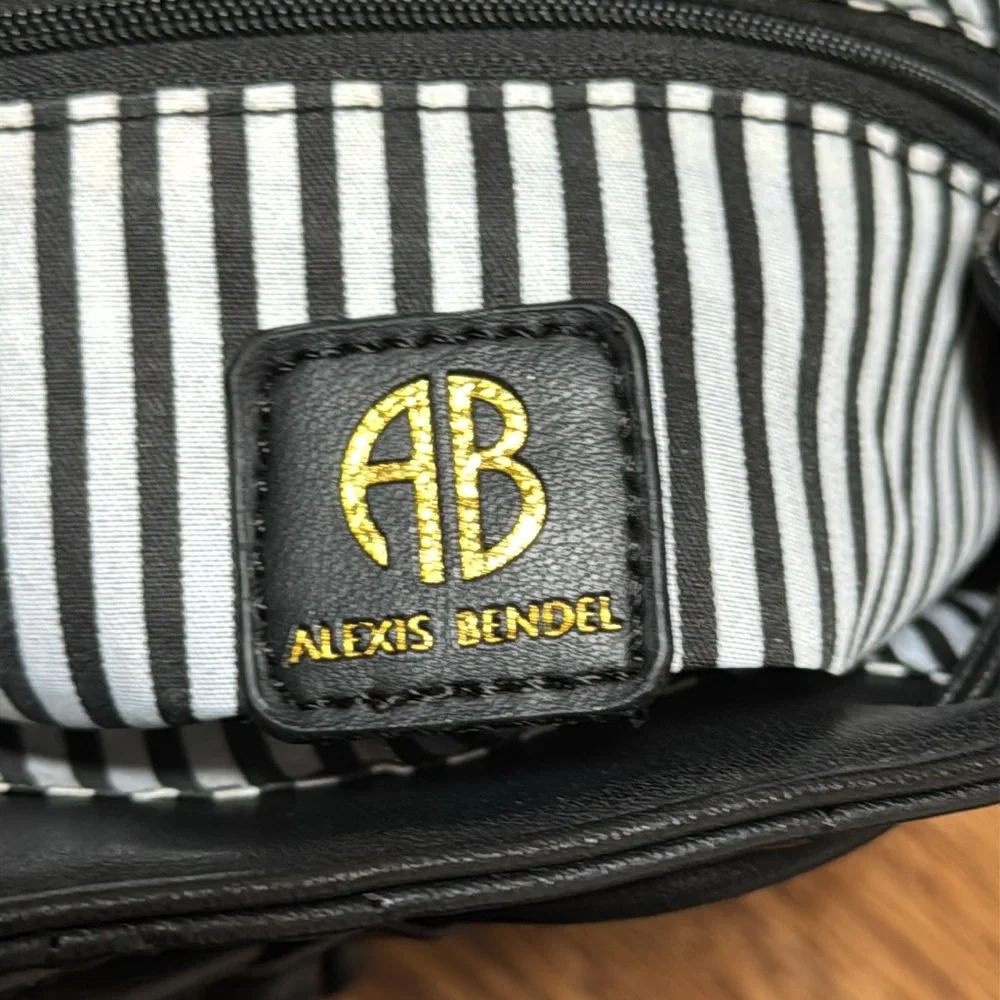 Alexis Bendel black quilted vegan leather adjustable backpack